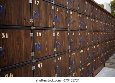 Wooden public key lockers with number, selective focus