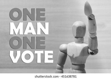 Wooden Puppet With One Hand Raised, One Man One Vote, Concept For Voting Policy