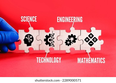 Wooden puzzle connection with STEM icon. science, technology, engineering, mathematics education word with icons. 
