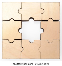 Wooden Puzzle Game With Lost Central Piece. Hole In The Middle.  Isolated On White Background. 
