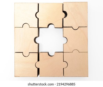 Wooden Puzzle Game With Lost Central Piece. Hole In The Middle.  Isolated On White Background. 
