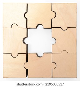 Wooden Puzzle Game With Lost Central Piece. Hole In The Middle.  Isolated On White Background. 
