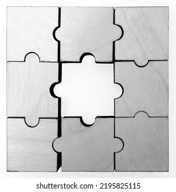 Wooden Puzzle Game With Lost Central Piece. Hole In The Middle.  Isolated On White Background. 
