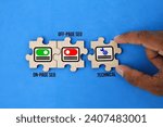 wooden puzzle with icons and words on page seo, off page seo and technical