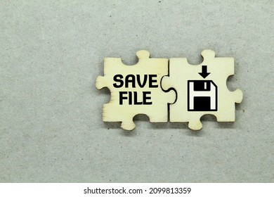 Wooden Puzzle With Save File Icon And Word Save File