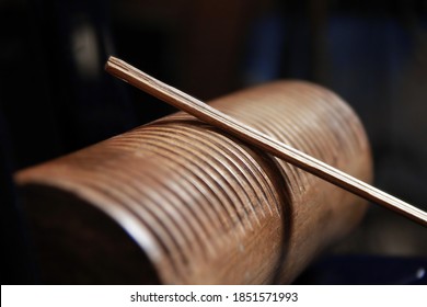 
Wooden reco-reco with rod - percussion instrument