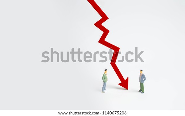 A wooden red chart arrow down divides the
two people discussing the case. Termination and breakdown of
relations, breaking ties. Contract break, conflict of interests.
Negotiations of businessmen.