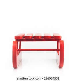 Wooden Red Sled Isolated On White Background