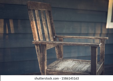 Wooden Rocking Chair on Porch