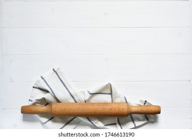 Wooden Rolling Pin With A Napkin On A Concrete Background With A Place For A Recipe. View From Above. Flatly