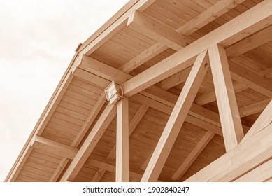 Wooden roof structure. Glued laminated timber roof. Rafters made of wood. - Shutterstock ID 1902840247