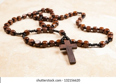 Wooden Rosary Beads And Cross.