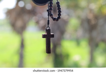 Wooden Rosary Cross Symbolizing Christianity And The Lenten Season