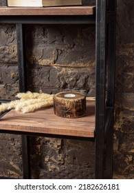 Wooden Round Candle Holder And Candle On Shelf. Natural Wood Texture