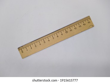 Wooden Ruler. One Old Wooden Ruler Ten Centimeters On A White Background Top View