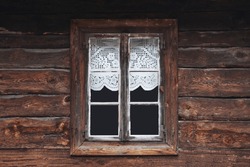 Wooden Rustic Window In Cottage House. Lace Curtains Glass Window Home. Rusty Architecture. Podlasie Region In Poland Vintage Wall. Wood Home Wall Facade. Village Farm Building.