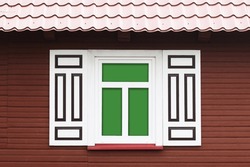 Wooden Rustic Window In Cottage House. Rusty Architecture. Podlasie Region In Poland Vintage Wall. Wood Home Wall Facade. Decorative Shutters. Village Farm Building. Green Screen Interior.