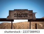 Wooden Saloon Sign in Old Wild West Ghost Town