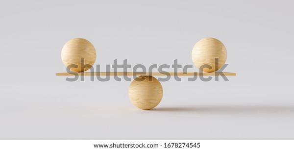 wooden scale balancing two big wodden balls.\
Concept of harmony and\
balance