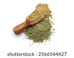 A wooden scoop filled with organic Small Fennel Seeds (Foeniculum vulgare) powder, placed beside a heap of Fennel Seeds, isolated on a white background.