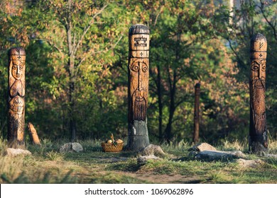 Wooden sculptures of pagan gods on island Khortitsa in city Zaporozhye, Ukraine.