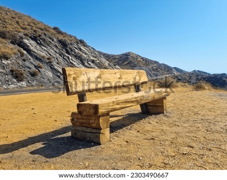 Wooden seat to relax looking at infinity