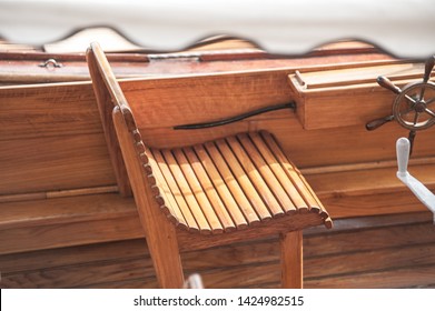 Wooden Seat In A Vintage, Open Wooden Boat.