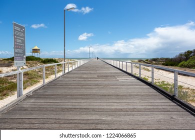 The Wooden Semaphore Jetty With A Blue Sky And White Clouds Above Taken At Semaphore Beach South Australia On 7th November 2018