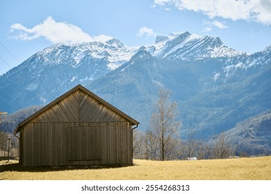 Wooden shed in alpine valley - Powered by Shutterstock