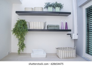 Wooden Shelf  In Laundry Room In Home