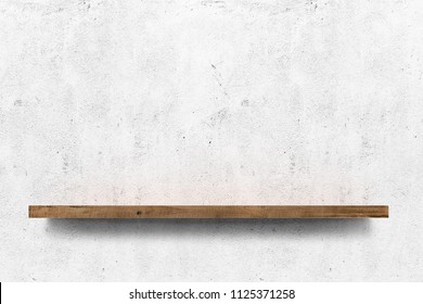 Wooden shelf over white concrete wall background - Shutterstock ID 1125371258