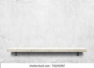 Wooden Shelf Over White Concrete Background