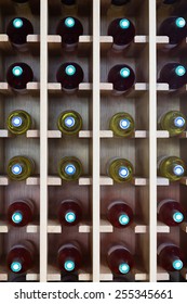 Wooden Shelves With Wine Bottles At  Cafe Or Bodega