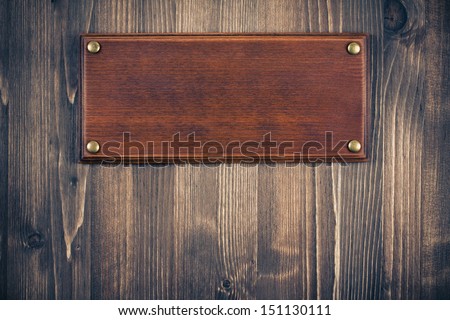 Wooden sign board blank frame on old wood background