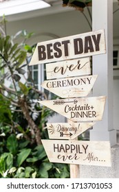 Wooden Sign In Wedding Ceremony, On The Plates There Is An Inscription Of Direction About Wedding, Wedding Direction Board For Guests