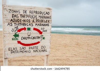 Wooden Signboard On The Sal Beach. Translation: The Marine Turtle Breeding Area, Help Us Protect The Caretta Caretta Turtles. National Heritages In Cape Verde Island, Africa