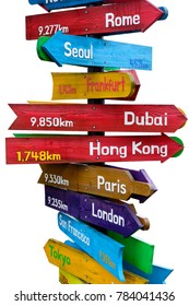 Wooden Signpost Indicating Directions Of Nine World Continents Over White Background