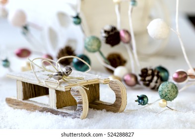 Wooden Sled With Snow, Christmas Garland And Cart