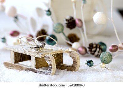 Wooden Sled With Snow, Christmas Garland And Cart