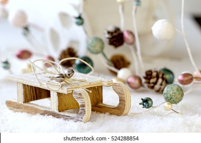 Wooden Sled With Snow, Christmas Garland And Cart