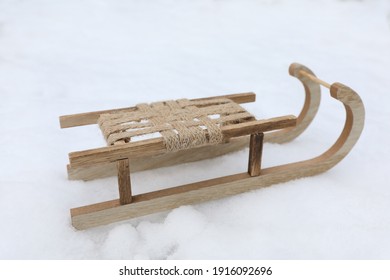 Wooden Sleigh On Snow Outdoors. Winter Activity