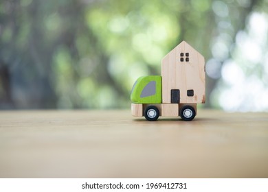 Wooden Small Home With Car For Moving House Or Home Building Renovation For Good Community Concept