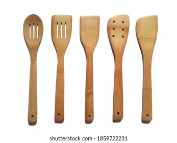 Wooden Spatula And Natural Wood Ladle On A White Background