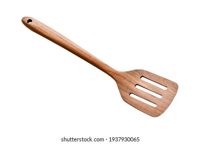 Wooden spatula on white background. - Shutterstock ID 1937930065