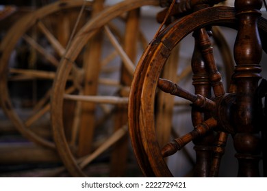 Wooden Spinning Wheel. The Traditional Method Of Making Woolen Threads