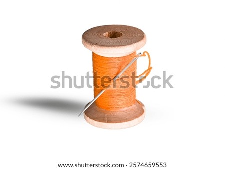 Similar – Image, Stock Photo Vibrant orange yarn spools in industrial setting