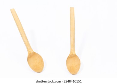 wooden spoon at different angles on a white background - Shutterstock ID 2248410151