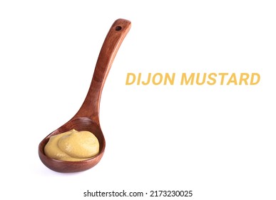 Wooden Spoon With Dijon Mustard On A White Background And The Inscription DIJON MUSTARD.