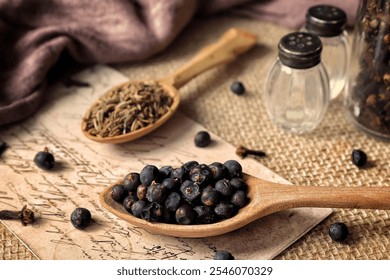 A wooden spoon filled with fresh blueberries next to spices creates a rustic kitchen scene, highlighting the beauty of natural ingredients and culinary arts. - Powered by Shutterstock