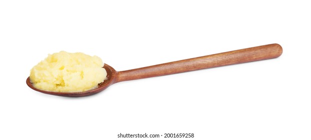 Wooden spoon of Ghee butter isolated on white
